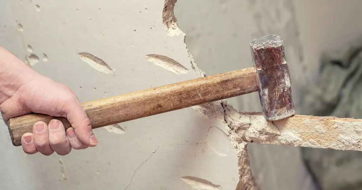 A person holding a hammer